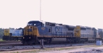 CSX 9027 & 8888 head southbound with a train